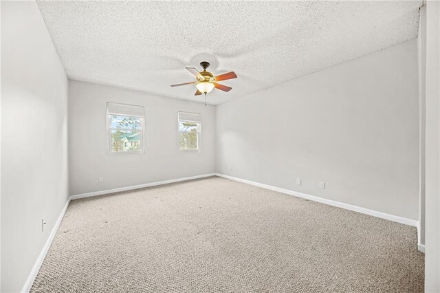 23 Chelsea Ct, Avondale Estates, GA 30002 - carpeted empty room featuring a textured ceiling, a ceiling fan, and baseboards