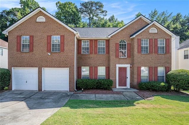 view of front facade featuring a front lawn and a garage