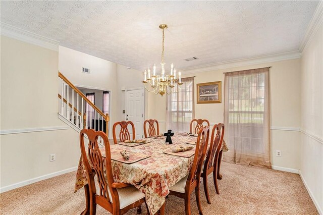 dining space with light carpet, crown molding, a textured ceiling, and a notable chandelier