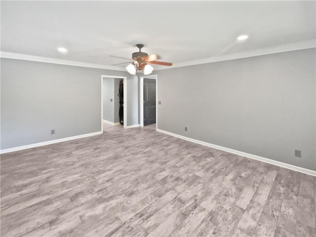 spare room with recessed lighting, a ceiling fan, and baseboards