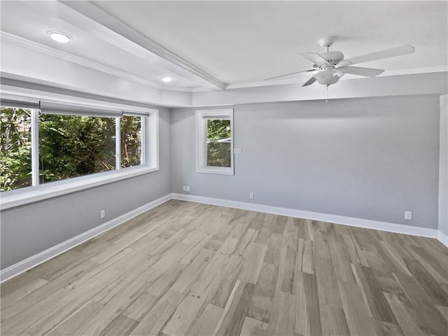 empty room featuring crown molding, a ceiling fan, wood finished floors, baseboards, and recessed lighting