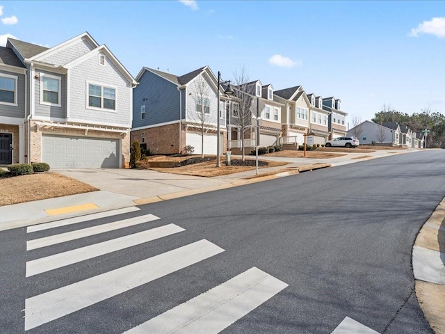 view of street with curbs, sidewalks, and a residential view