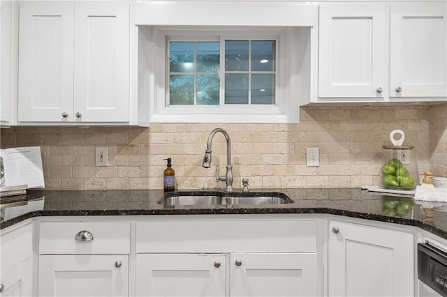 2070 Drew Valley Rd NE, Brookhaven, GA 30319 - kitchen with white cabinetry, decorative backsplash, dark stone counters, and dishwasher
