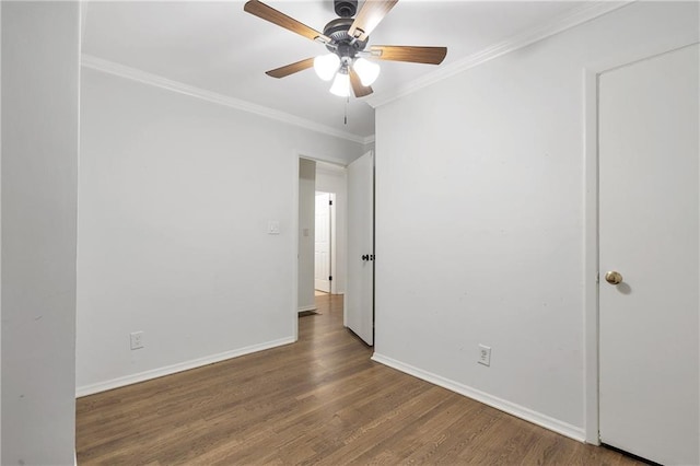 2070 Drew Valley Rd NE, Brookhaven, GA 30319 - unfurnished bedroom featuring crown molding, wood finished floors, and ceiling fan
