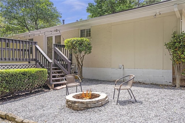 2070 Drew Valley Rd NE, Brookhaven, GA 30319 - view of patio / terrace featuring a fire pit, stairs, and a deck