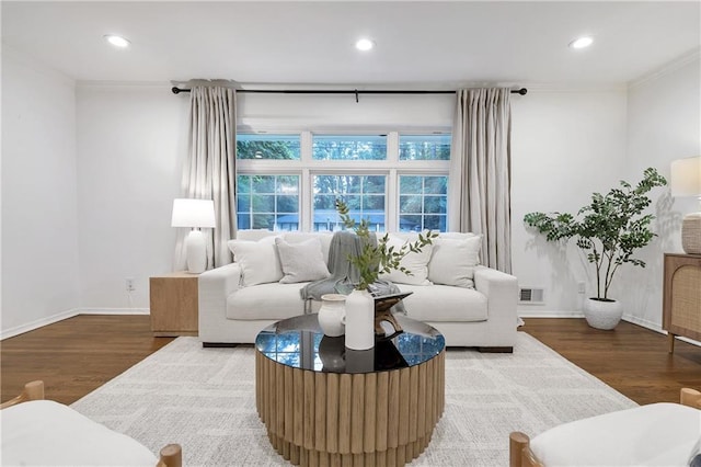 2070 Drew Valley Rd NE, Brookhaven, GA 30319 - living area with wood finished floors, recessed lighting, and crown molding