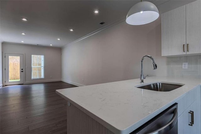 117 Chateau Dr Unit 117, Rome, GA 30161 - kitchen featuring a sink, backsplash, crown molding, light stone countertops, and appliances with stainless steel finishes
