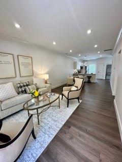 stairway with hardwood / wood-style flooring