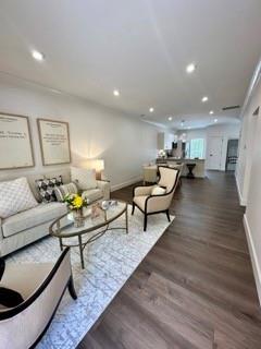 117 Chateau Dr Unit 117, Rome, GA 30161 - spare room with dark wood-style flooring, baseboards, visible vents, recessed lighting, and a ceiling fan