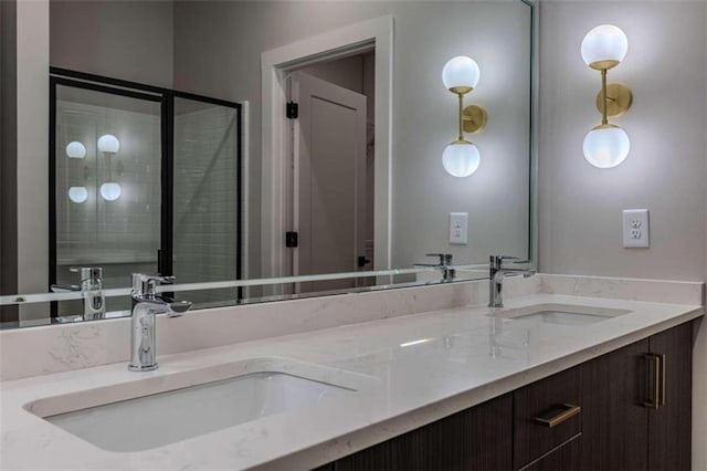 117 Chateau Dr Unit 117, Rome, GA 30161 - bathroom featuring vanity, wood finished floors, a shower stall, and a walk in closet