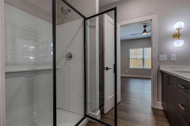 117 Chateau Dr Unit 117, Rome, GA 30161 - bathroom featuring a ceiling fan, wood finished floors, a sink, and double vanity