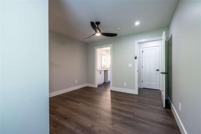 117 Chateau Dr Unit 117, Rome, GA 30161 - unfurnished bedroom featuring a ceiling fan, baseboards, recessed lighting, and dark wood finished floors