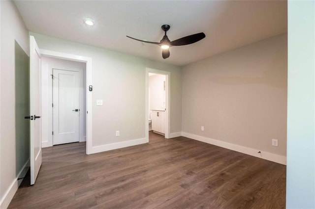 117 Chateau Dr Unit 117, Rome, GA 30161 - unfurnished bedroom with ensuite bath, baseboards, wood finished floors, and recessed lighting