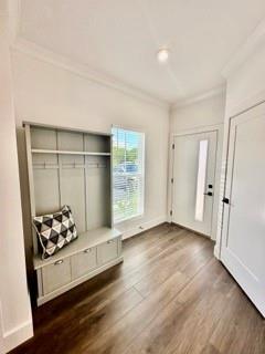 washroom with stacked washer and dryer