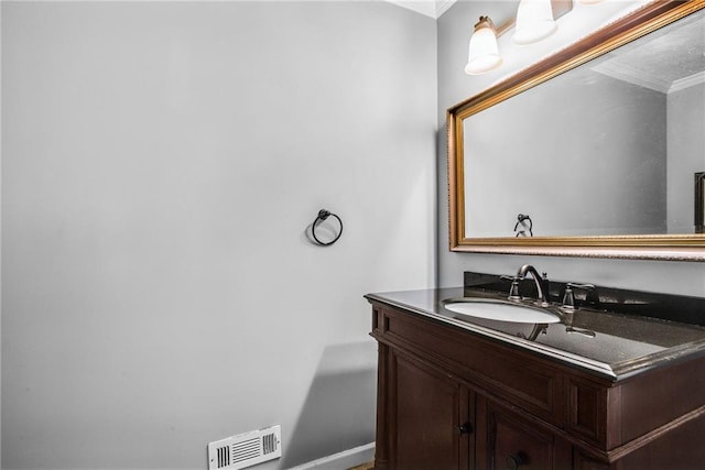 bathroom with vanity and visible vents