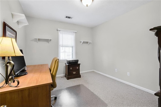 home office featuring visible vents, carpet, and baseboards