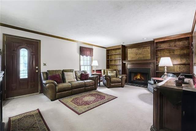 living area with a fireplace with flush hearth, carpet, ornamental molding, and a textured ceiling