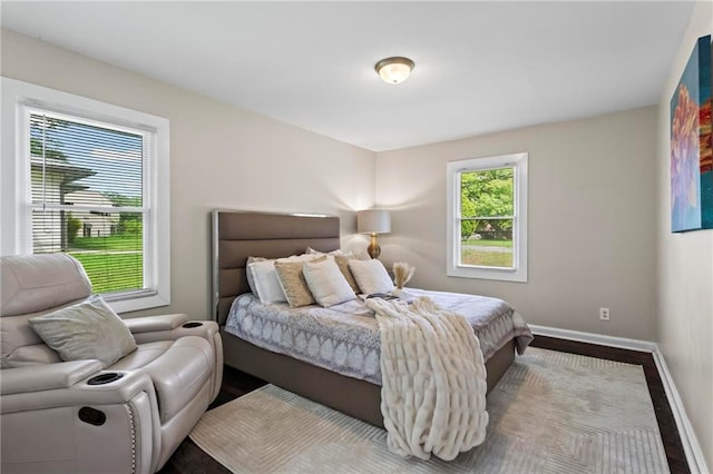 629 Dunton Cir SE, Smyrna, GA 30082 - bedroom with baseboards and wood finished floors