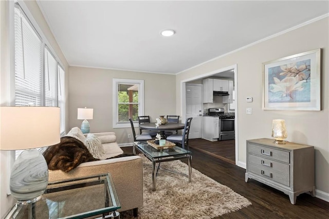 629 Dunton Cir SE, Smyrna, GA 30082 - living room with ornamental molding, dark wood finished floors, baseboards, and recessed lighting