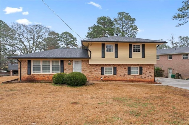 2002 Twin Falls Rd, Decatur, GA 30032 - split level home featuring brick siding and a front lawn