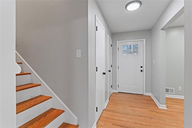 2002 Twin Falls Rd, Decatur, GA 30032 - entryway with light wood-type flooring and stairs