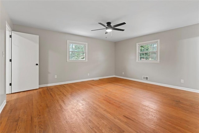 2002 Twin Falls Rd, Decatur, GA 30032 - spare room featuring healthy amount of natural light, light wood finished floors, and ceiling fan