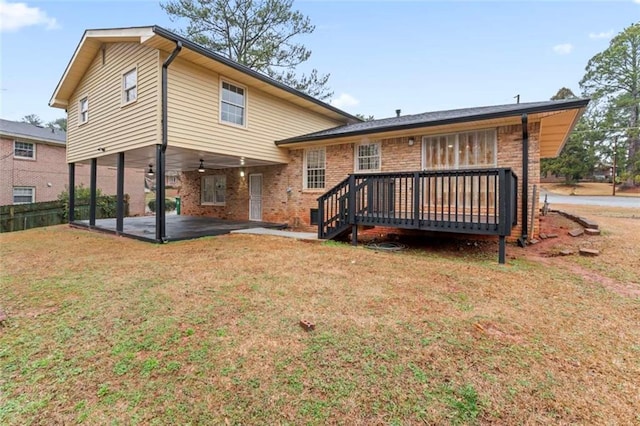 2002 Twin Falls Rd, Decatur, GA 30032 - rear view of house featuring a patio, a carport, brick siding, a deck, and ceiling fan