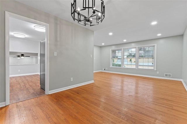 2002 Twin Falls Rd, Decatur, GA 30032 - empty room featuring light wood-type flooring, a chandelier, a ceiling fan, and recessed lighting