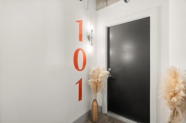 entryway with concrete floors