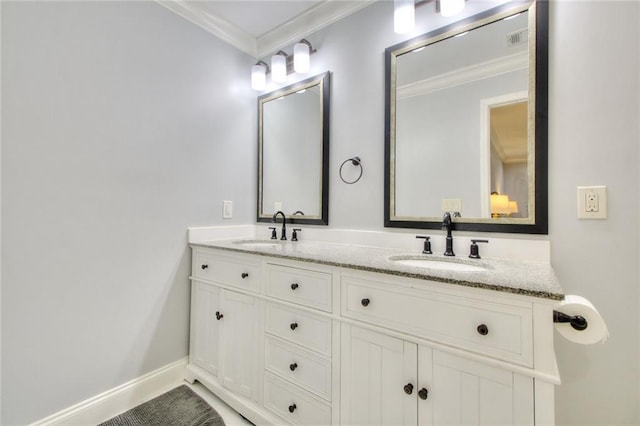 2944 Berry Rd, Loganville, GA 30052 - full bathroom featuring a sink, ornamental molding, double vanity, and visible vents
