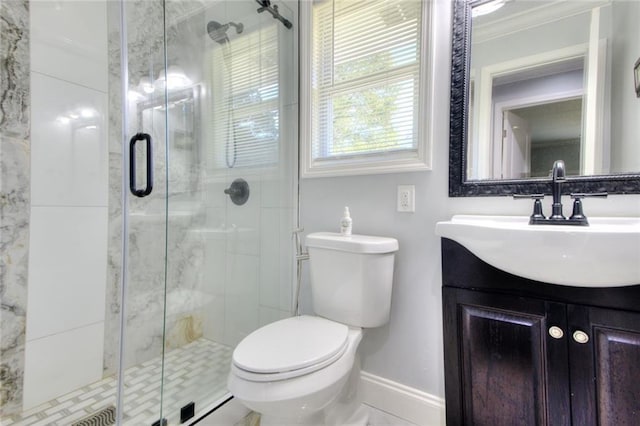 2944 Berry Rd, Loganville, GA 30052 - full bathroom with vanity, toilet, baseboards, ornamental molding, and a stall shower