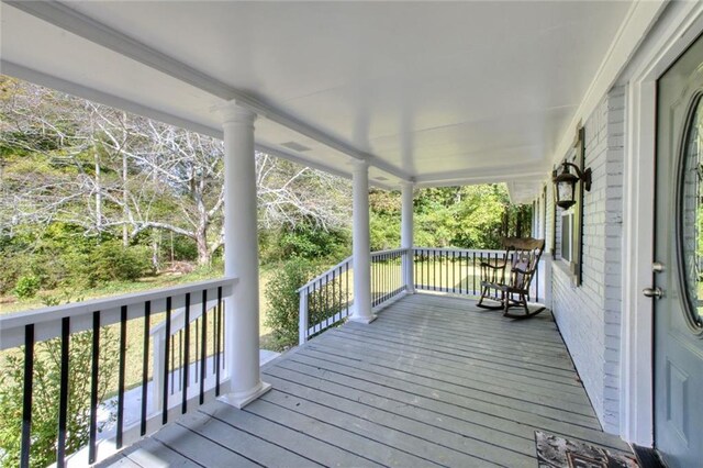 2944 Berry Rd, Loganville, GA 30052 - wooden terrace featuring a porch