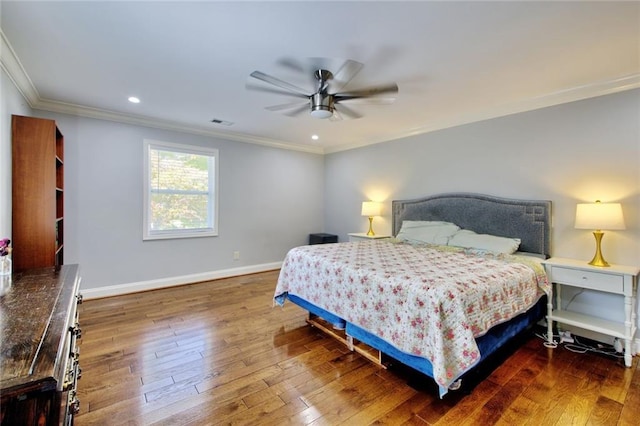 2944 Berry Rd, Loganville, GA 30052 - bedroom featuring crown molding, baseboards, hardwood / wood-style floors, and visible vents