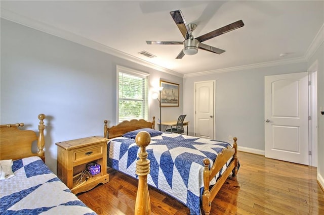 2944 Berry Rd, Loganville, GA 30052 - bedroom with baseboards, ornamental molding, hardwood / wood-style floors, and visible vents
