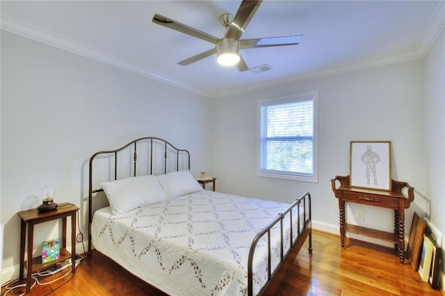 2944 Berry Rd, Loganville, GA 30052 - bedroom featuring baseboards, a ceiling fan, crown molding, and wood finished floors