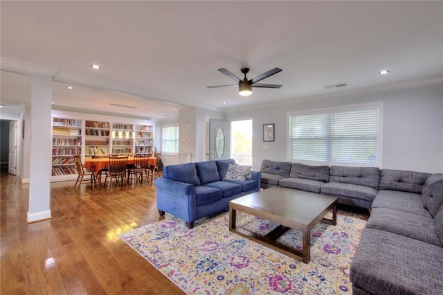 2944 Berry Rd, Loganville, GA 30052 - living area with visible vents, ornamental molding, wood finished floors, ceiling fan, and recessed lighting
