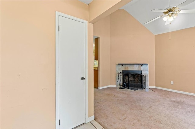 5340 Young Deer Dr, Cumming, GA 30041 - unfurnished living room featuring carpet floors, vaulted ceiling, a ceiling fan, a tile fireplace, and baseboards