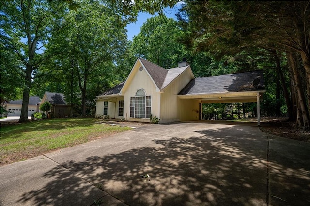 5340 Young Deer Dr, Cumming, GA 30041 - ranch-style home featuring driveway, a chimney, and a front lawn