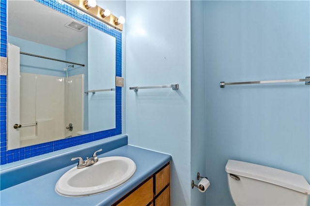 5340 Young Deer Dr, Cumming, GA 30041 - bathroom with toilet, a shower, and vanity
