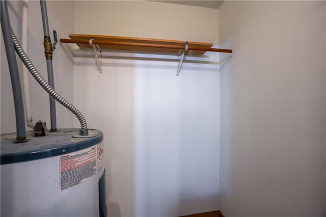 5340 Young Deer Dr, Cumming, GA 30041 - walk in closet featuring water heater