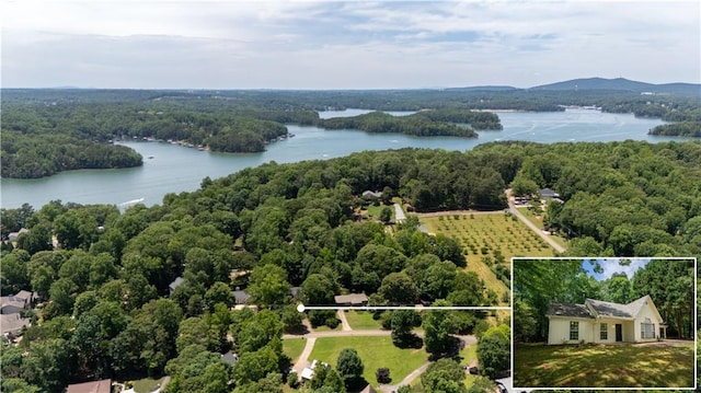 5340 Young Deer Dr, Cumming, GA 30041 - aerial view of property and surrounding area with a nearby body of water, property parcel outlined, and a forest