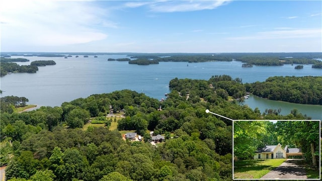 5340 Young Deer Dr, Cumming, GA 30041 - aerial view of property and surrounding area with property parcel outlined, a forest, and a nearby body of water