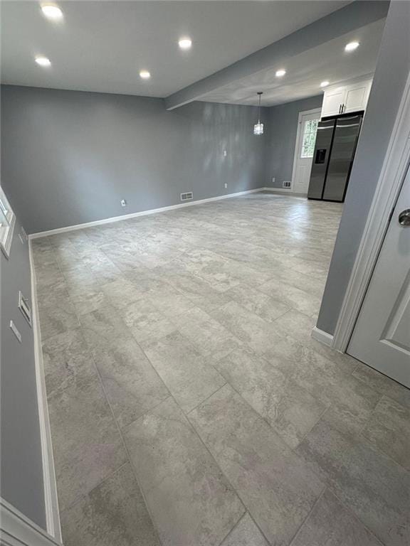 interior space with baseboards, visible vents, and recessed lighting
