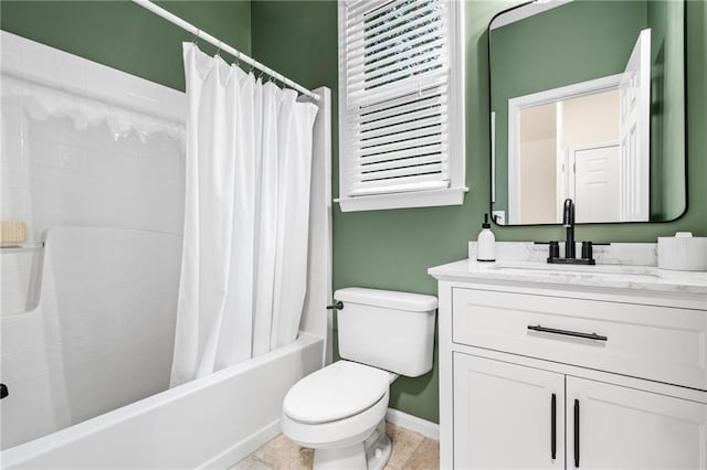 full bathroom with vanity, toilet, shower / tub combo, and tile patterned flooring