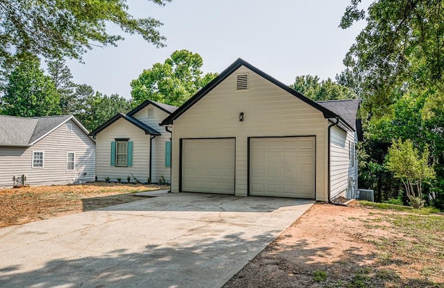 515 Allens Landing Ct, Lawrenceville, GA 30045 - view of front of property with a garage, central AC unit, and driveway
