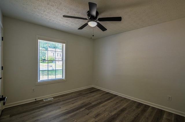 515 Allens Landing Ct, Lawrenceville, GA 30045 - unfurnished room with dark wood finished floors, a textured ceiling, baseboards, and a ceiling fan