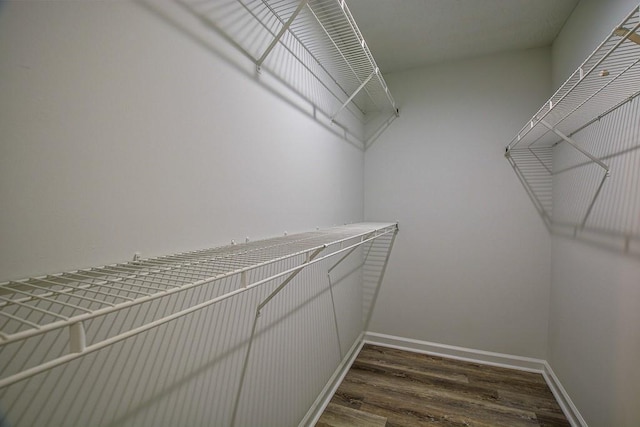 515 Allens Landing Ct, Lawrenceville, GA 30045 - spacious closet featuring dark wood finished floors