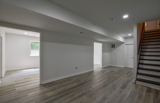 515 Allens Landing Ct, Lawrenceville, GA 30045 - below grade area featuring wood finished floors, stairway, baseboards, and recessed lighting