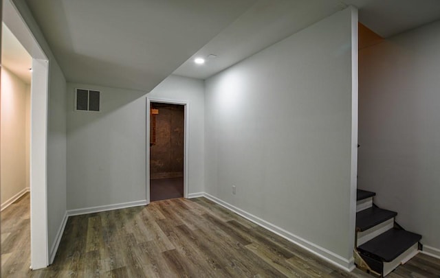 515 Allens Landing Ct, Lawrenceville, GA 30045 - finished basement with wood finished floors, baseboards, stairs, and recessed lighting