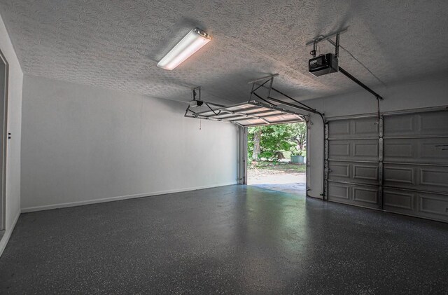 515 Allens Landing Ct, Lawrenceville, GA 30045 - garage featuring a garage door opener and baseboards